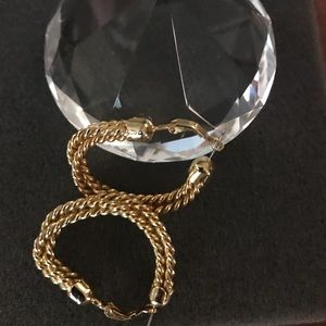 Pair of costume gold earrings